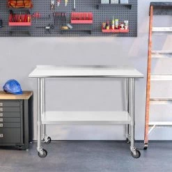 48 in. Stainless Steel Heavy Duty Garage Workstation Kitchen Utility Table with Wheels, Adjustable Shelf and Backsplash by Kahomvis -Kahomvis Sales Store silver kahomvis kitchen prep tables darg lkw1 746 31 1000